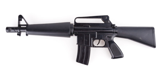 Black plastic gun isolated white background