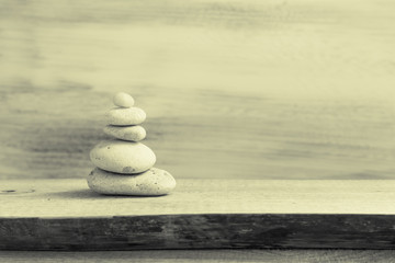 Pile zen stones wooden board
