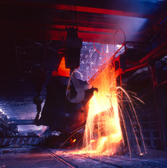 Cast Iron Casting in Metallurgy. Production. Industry Metal Hot Sparkes Steel  Flame Melt Factory