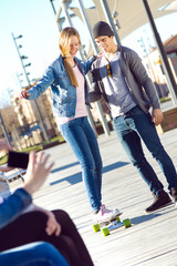 Two Friends having fun with skate