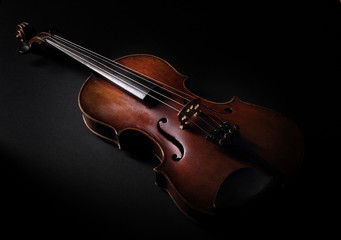 Vintage violin on dark background