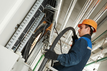 electrician worker at cabling