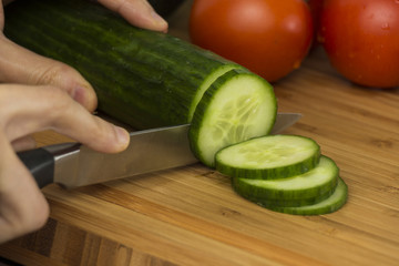 Cucumber slices on a cutting board