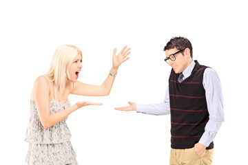 Young couple arguing isolated on white background