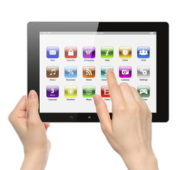 Woman hands hold and touch icon on tablet PC 