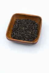 Sunflower seeds with wooden bowl