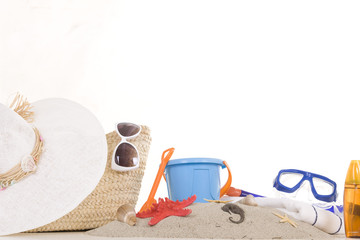 beach bag with toys and sunglasses for the whole family