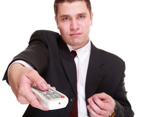 man with remote control changing channel