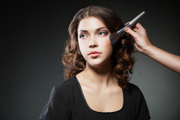 Make-up Applying closeup. Cosmetic Powder Brush