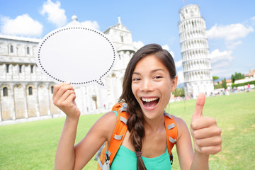 Travel tourist girl showing sign in Pisa, Italy