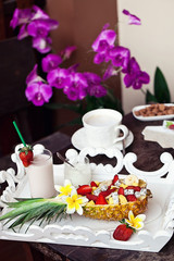Obraz na płótnie Canvas fruit salad in pineapple. breakfast surprise