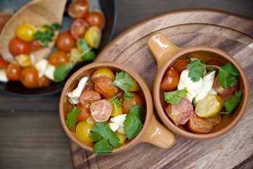 Appetizer of cherry tomatoes and mozzarella