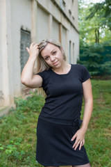 Young beautiful girl on a walk in the country