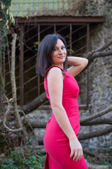 Fototapeta premium Young beautiful girl on a walk in the country