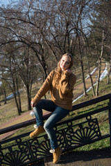 Young beautiful girl on a walk in the country