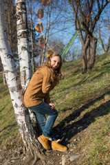 Young beautiful girl on a walk in the country