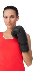 Portrait of a determined female boxer focused on training