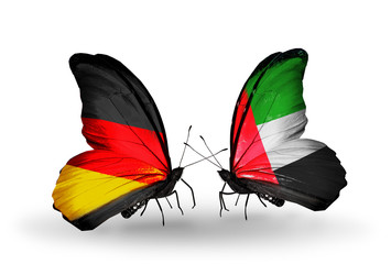 Two butterflies with flags Germany and UAE