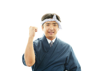 ガッツポーズの寿司職人