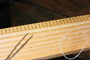 Obraz premium montaggio collana perle