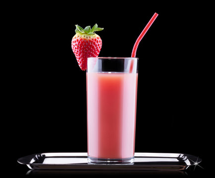 tasty summer fruits with juice in glass