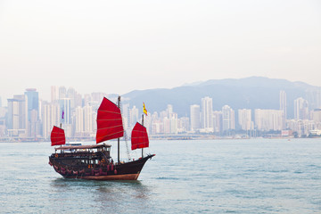 Wooden sailboat sailing in Hong Kong