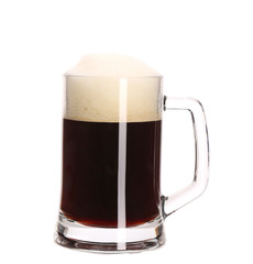 Tall big mug of brown beer with foam.