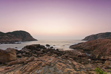 Fototapeta na wymiar Sunrise rocky coastline