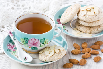 Cup tea with almond cookies