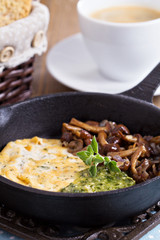 Vegan tofu omelet with mushrooms and pesto