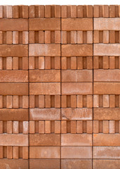 Fototapeta premium Stack of new red bricks