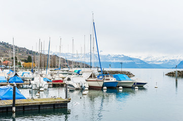 Fototapeta na wymiar Small port on the lake Geneva