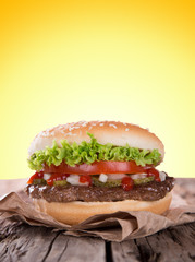 delicious hamburger on wood