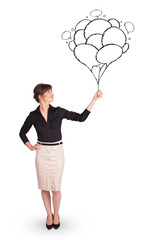 Happy woman holding balloons drawing