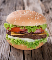 delicious hamburger on wood