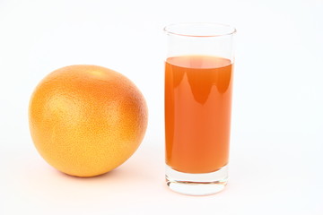 The grapefruits and drink on the white background