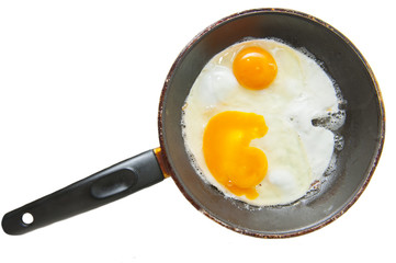 scrambled eggs on a pan