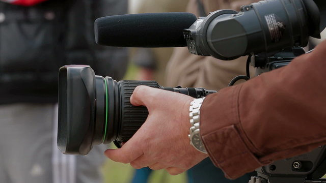 Videographer. Close-up at camera