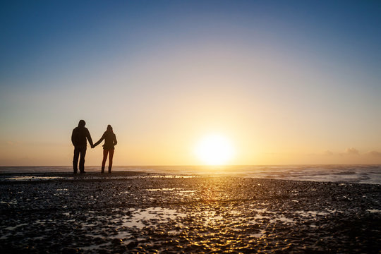 Romantic photo of couple during sunset