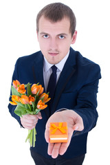 man holding gift box with wedding ring isolated on white