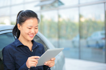 Fototapeta na wymiar young asian business woman use digital tablet