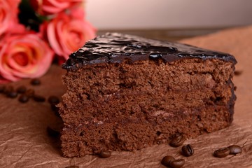 Delicious chocolate cake on table close-up