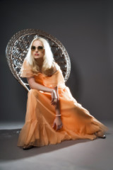 Obraz na płótnie Canvas Soft focus retro hippie 70s fashion sensual girl with long blond