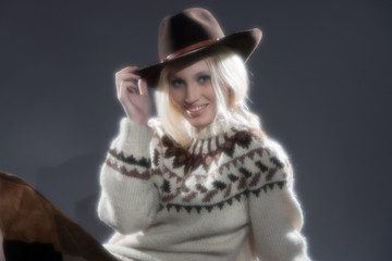 Fototapeta premium Retro soft focus hippie 70s winter fashion girl with long blonde