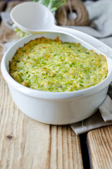 Casserole with cheese and wild garlic