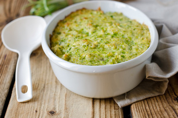 Casserole with cheese and wild garlic