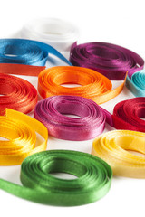 Coiled spools of colorful ribbons