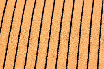 Orange alternating black fabric.