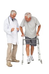 Doctor with senior man using walker