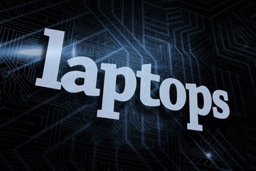 Laptops against futuristic black and blue background